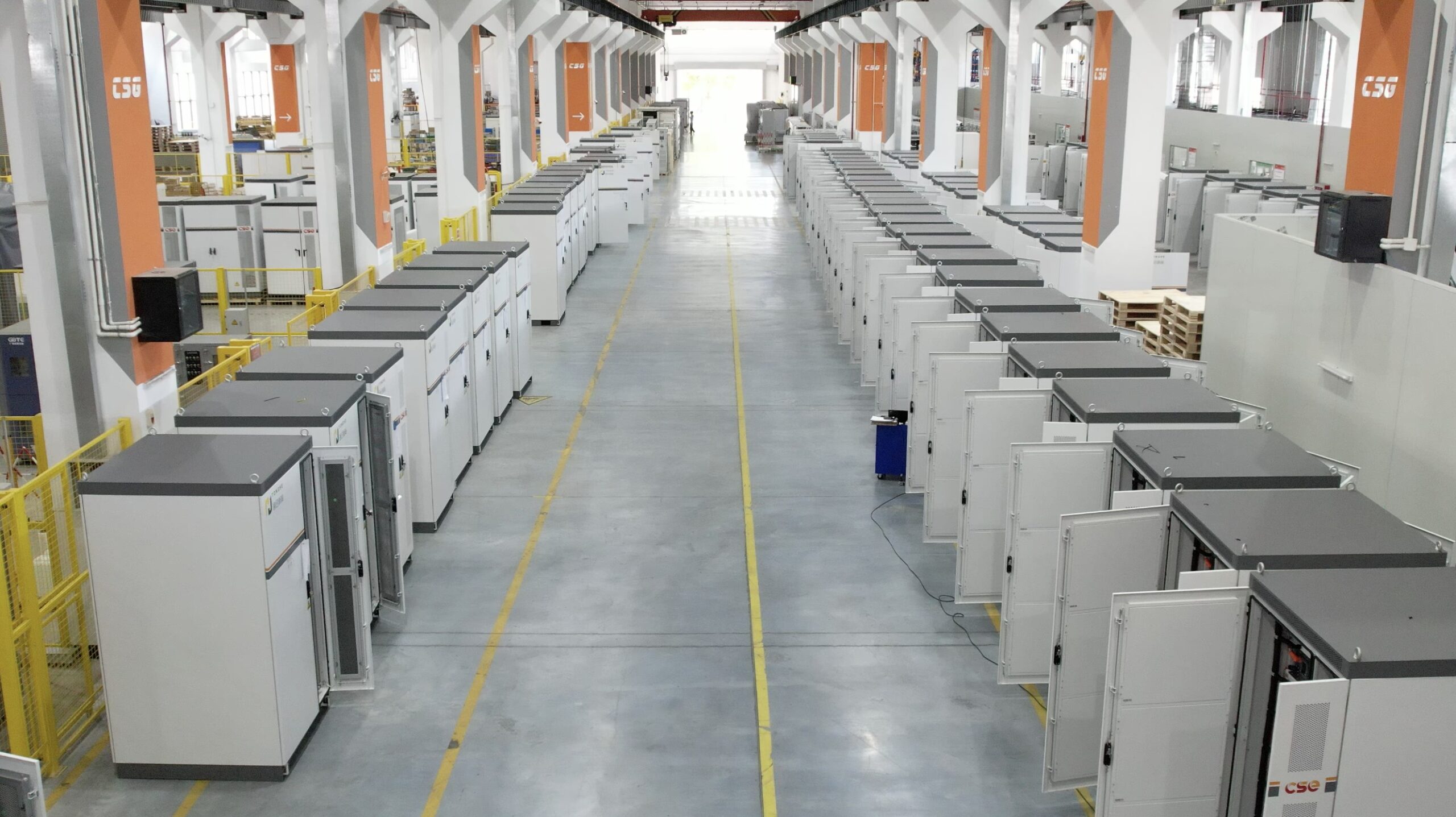 Rows of power-quality cabinets in Elumotive's production facility